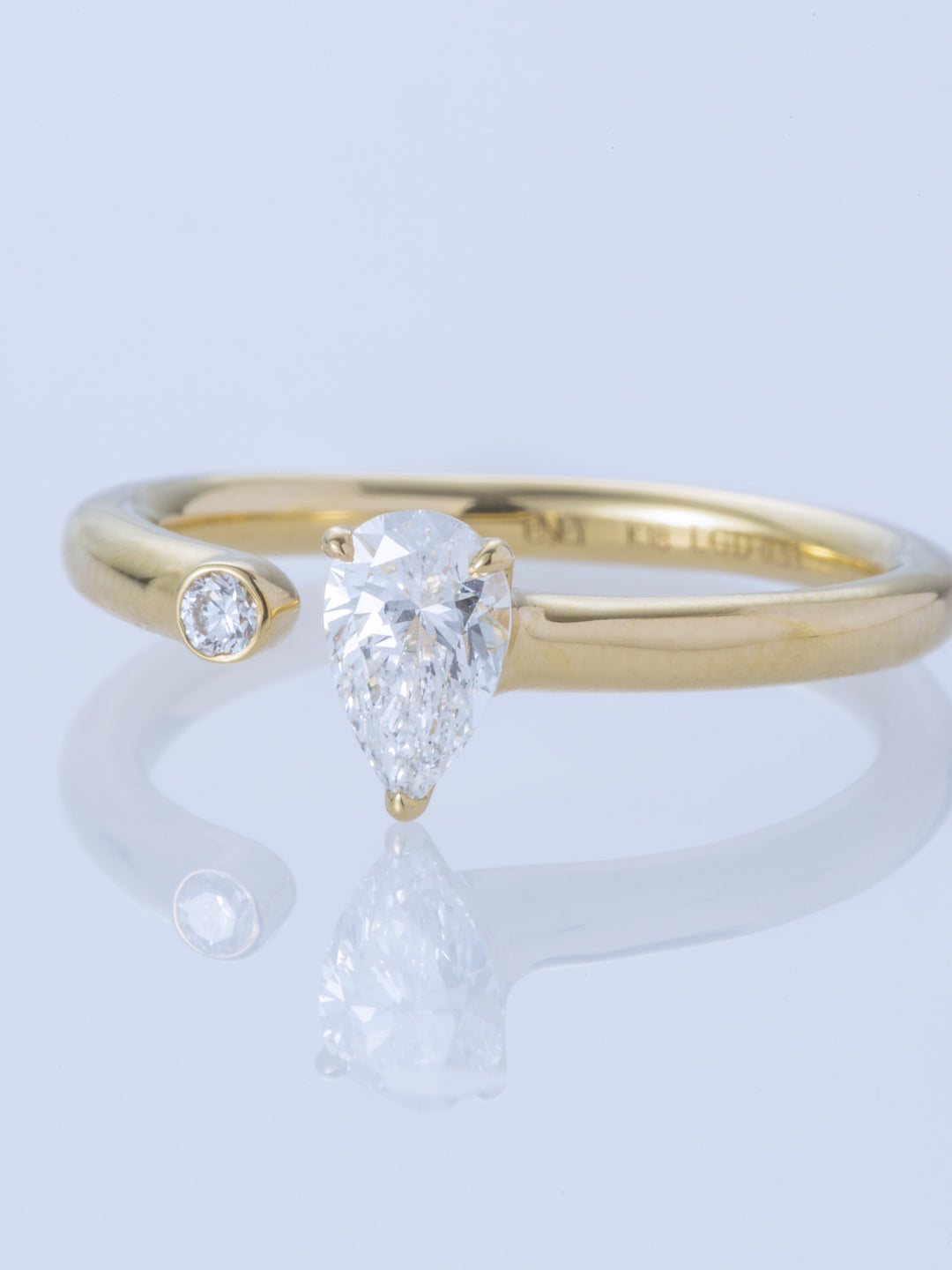 TWO K18YG PEAR/MELEE RING