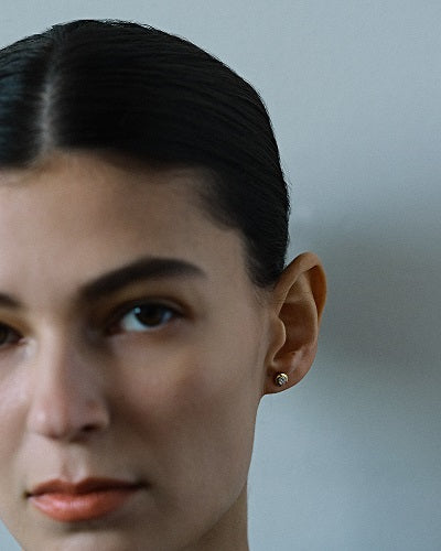 Boucles d'oreilles percées en or jaune 18 carats (0,23 carat)