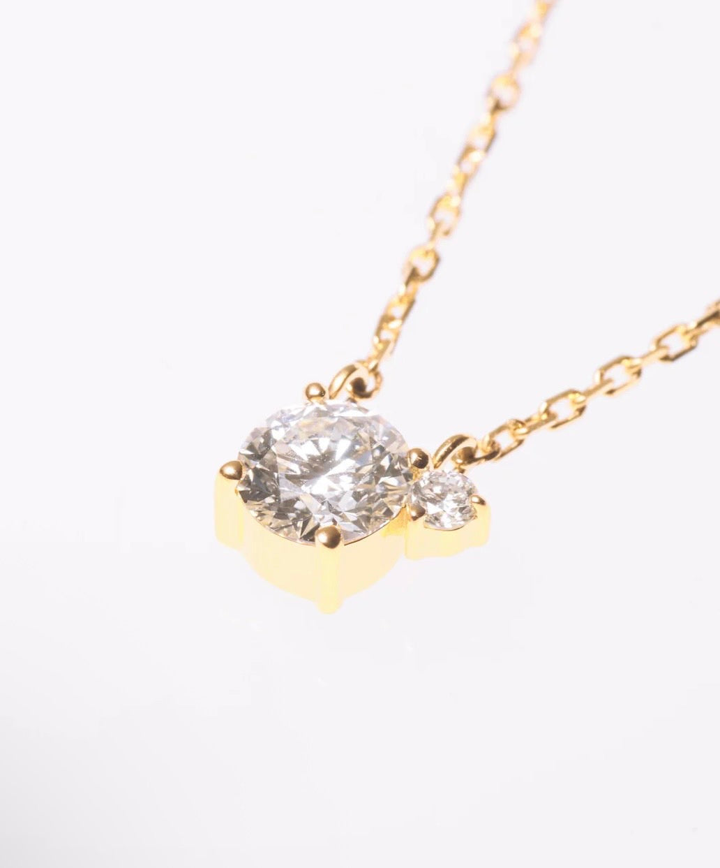 TWO K18YG 0.5ct ROUND NECKLACE