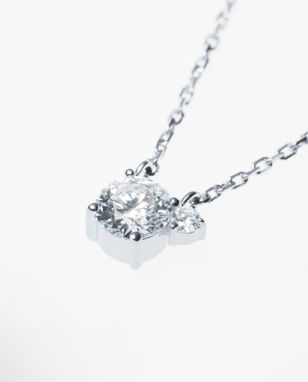 TWO PT850 0.5CT ROUND NECKLACE