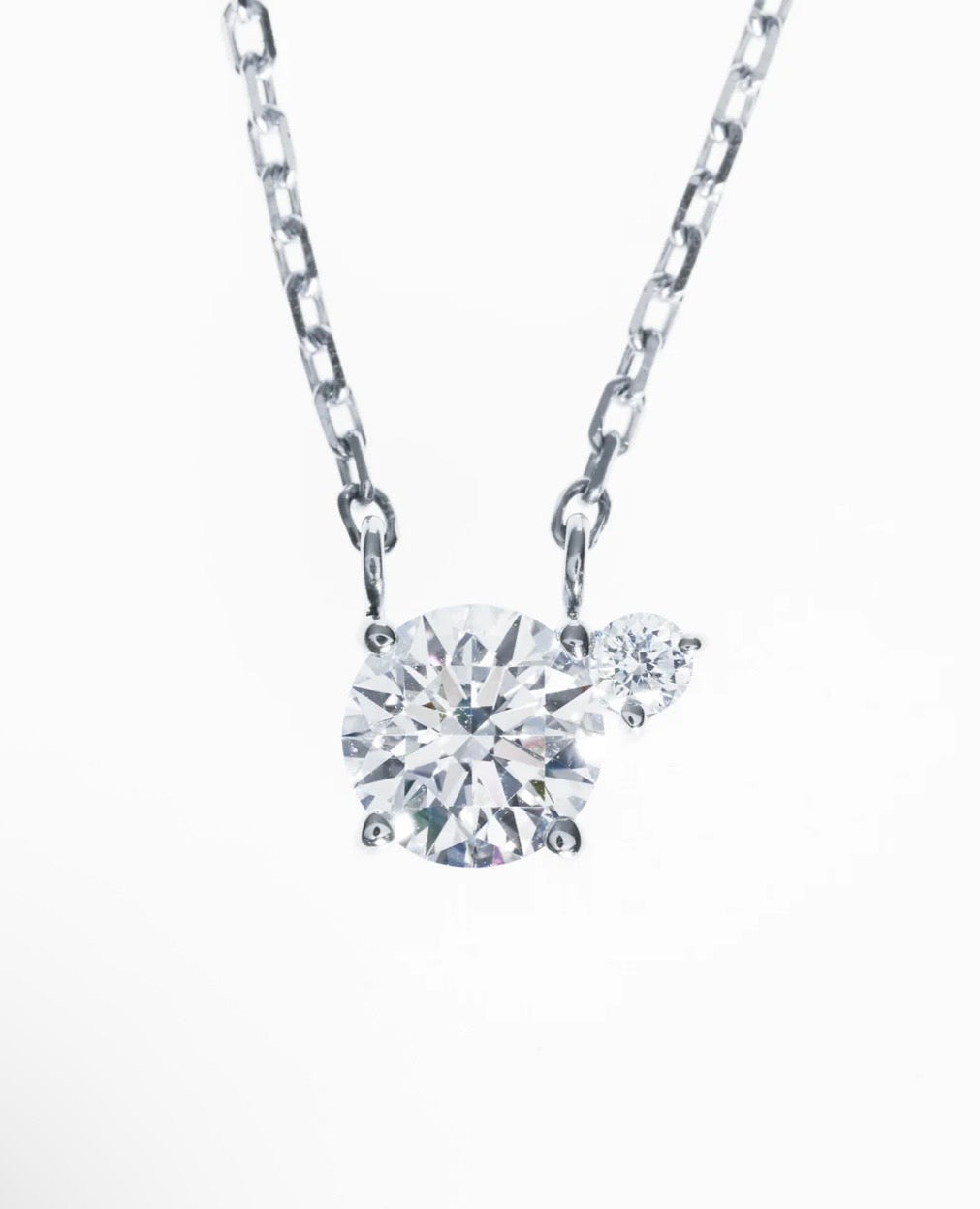 TWO PT850 0.5CT ROUND NECKLACE