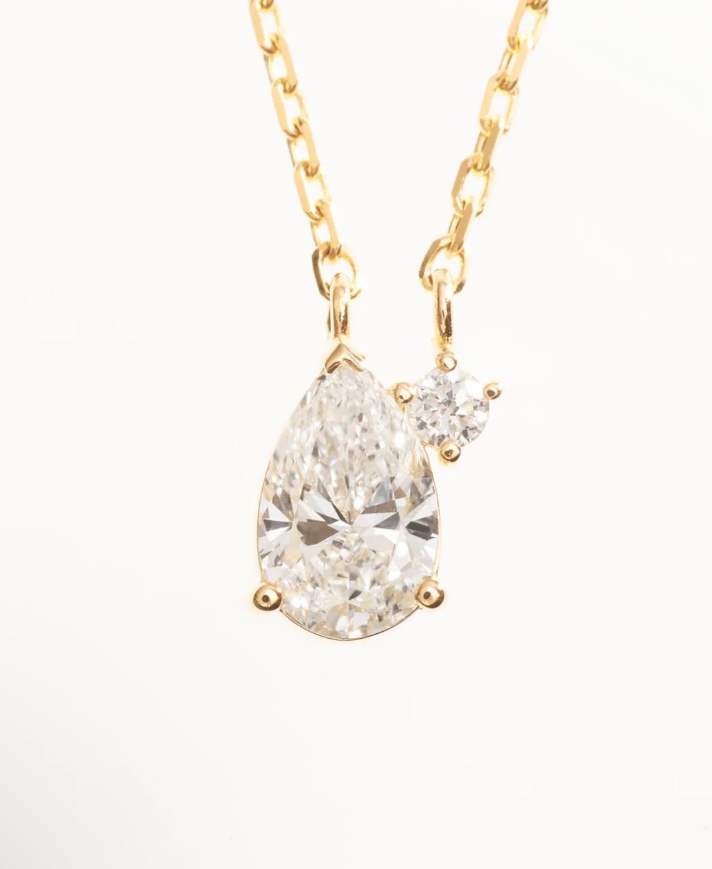 TWO K18YG 0.5CT PEAR NECKLACE