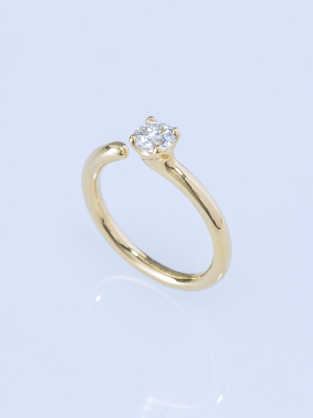ONE K18YG 0.5CT ROUND RING