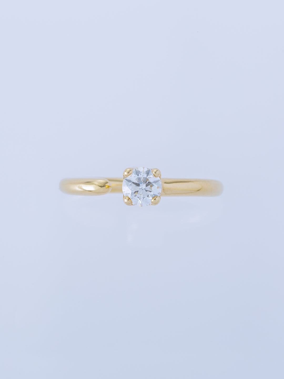 ONE K18YG 0.5CT ROUND RING