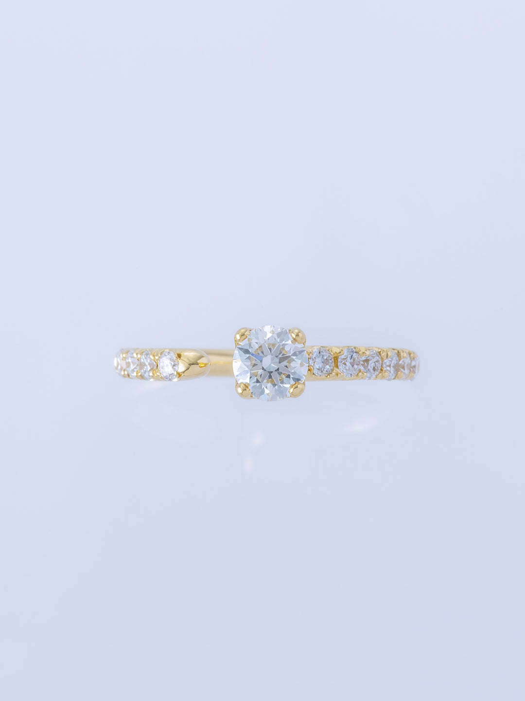 ONE K18YG ROUND 0.5CT HALF ETERNITY RING
