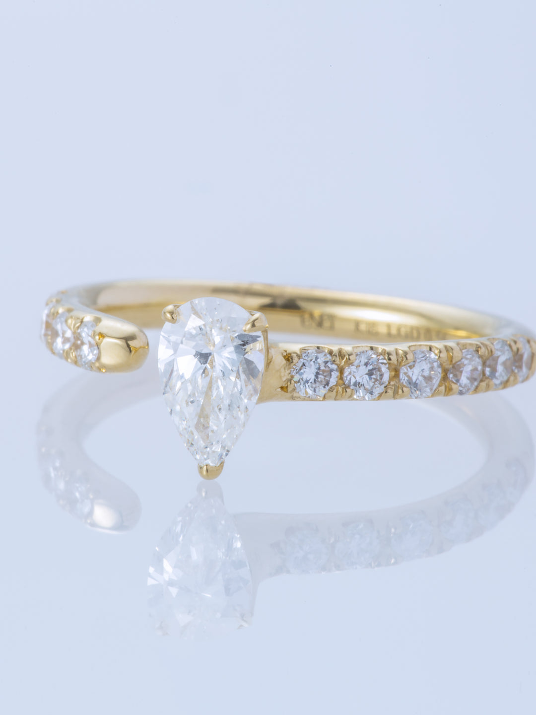 ONE K18YG PEAR 0.5CT HALF ETERNITY RING