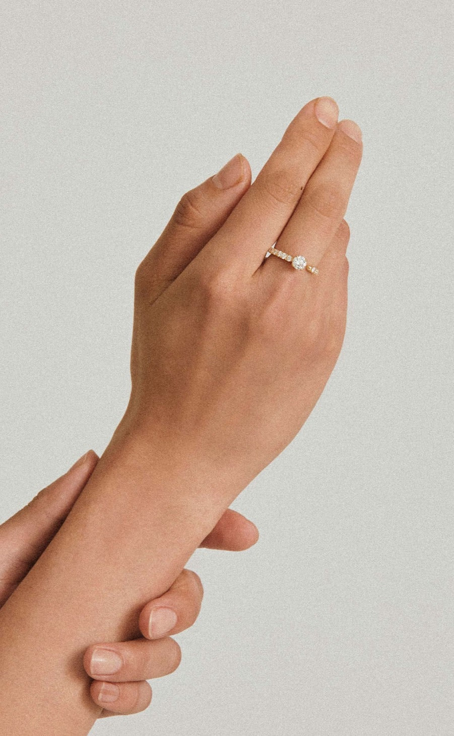 ONE K18YG ROUND 0.5CT HALF ETERNITY RING